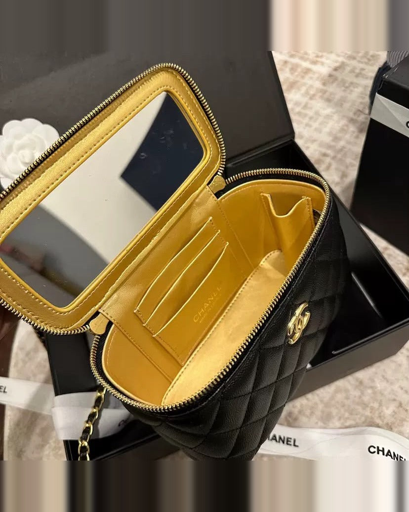 SUNVES CC VANITY BAG — inside view with the mirror and gold lining