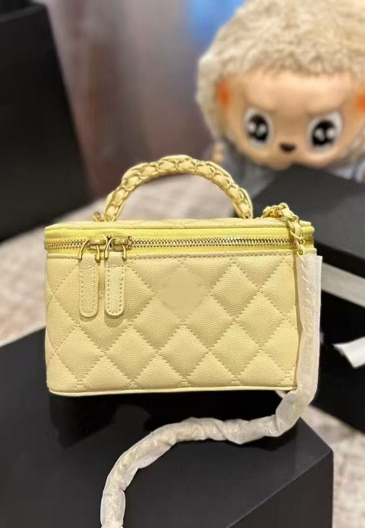 SUNVES CC VANITY BAG in Yellow, quilted vanity case with a top handle and chain strap