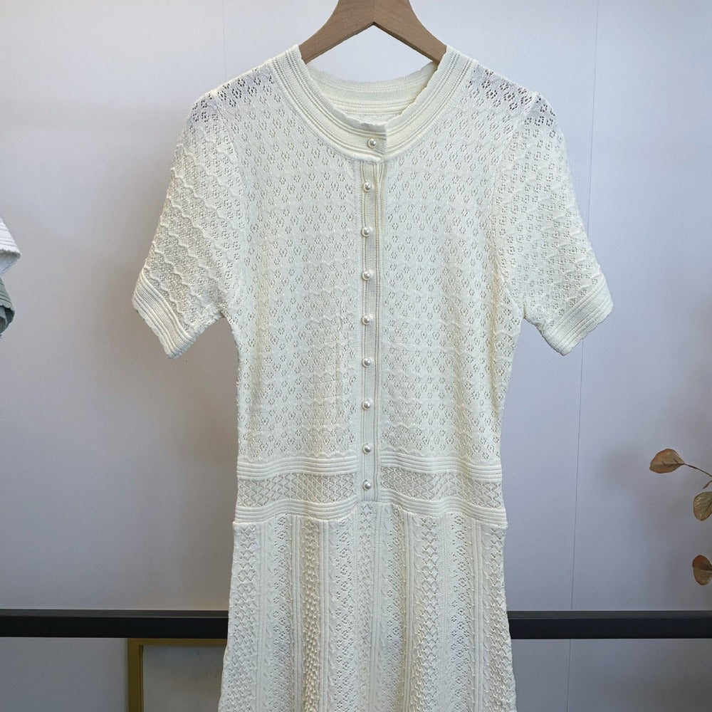 Sunves Pointelle Maxi Dress in white, hanging