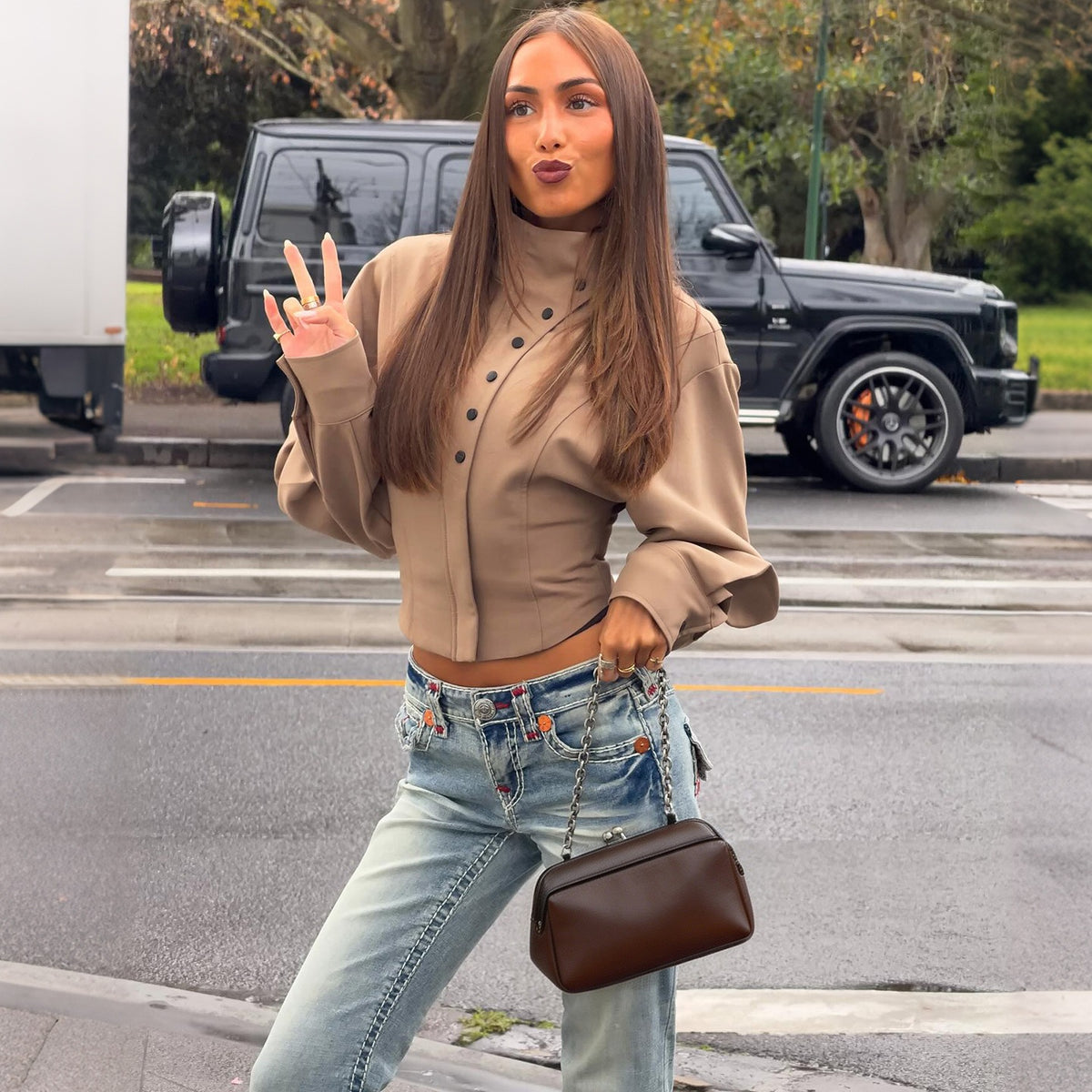 Sunves Rhea Cropped Top in taupe, front with hand raised
